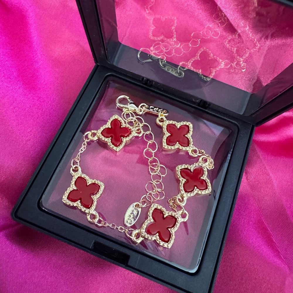 Elegant Gold and Red Clover Bracelet